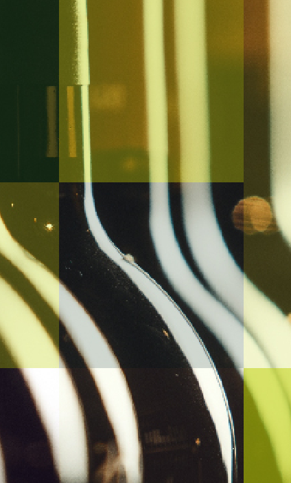 Close-up of wine bottles in soft lighting – Hogan Lovells Berlin case study on cross-border transactions and global consumer brands.