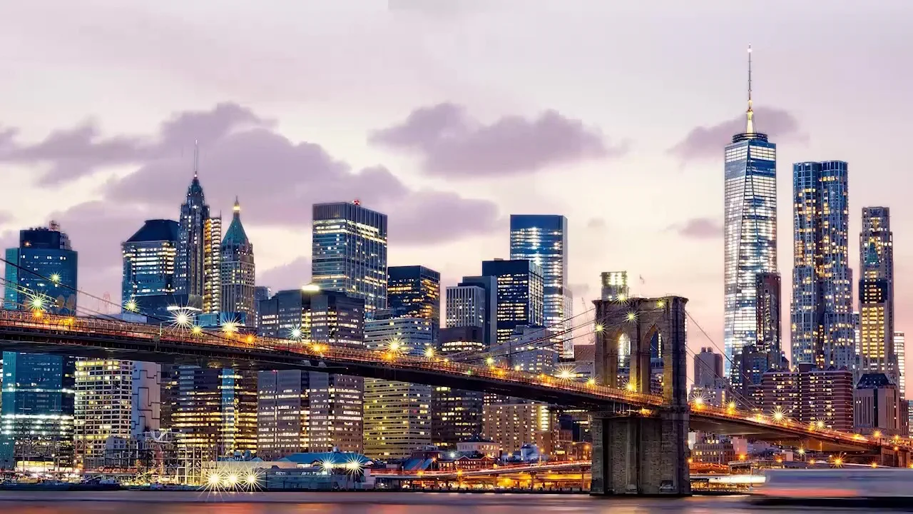 New York City skyline and Brooklyn Bridge illustrating the 2026 M&A Year in Review by Hogan Lovells, highlighting global mergers and acquisitions trends and market activity.